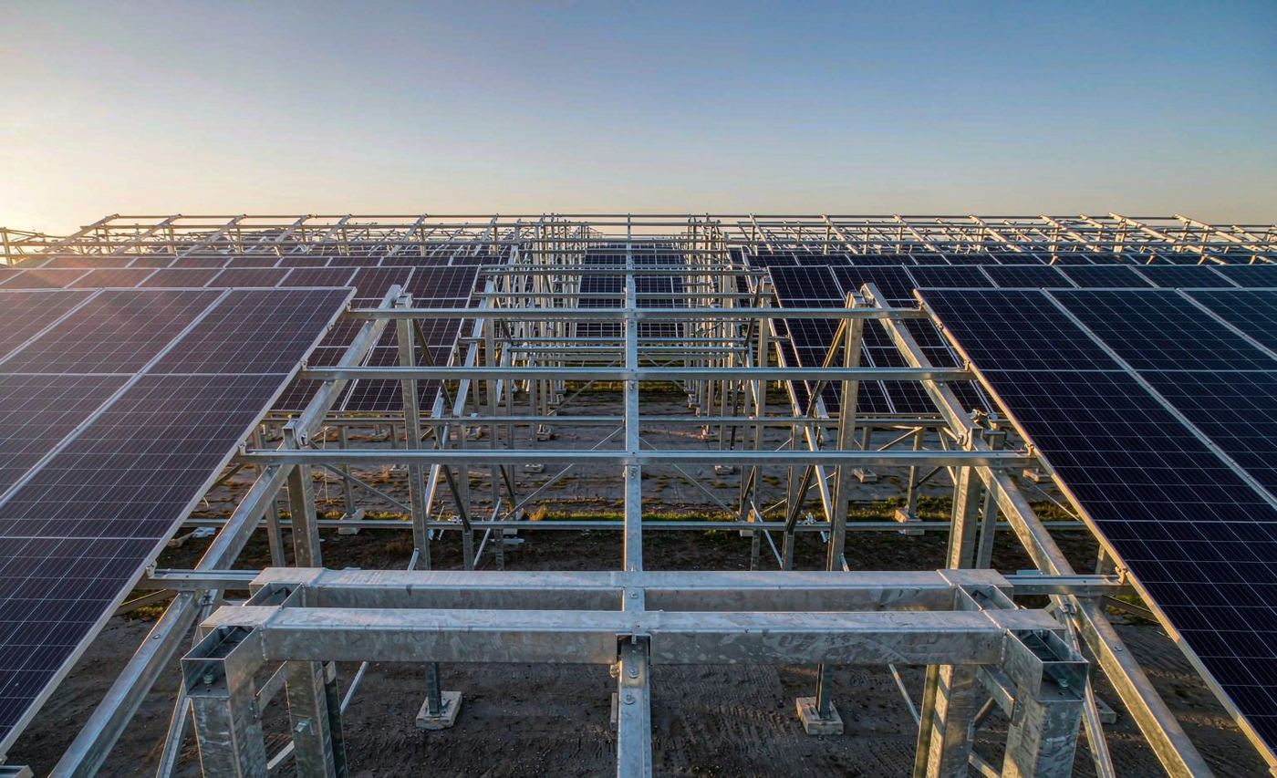 Ground-mounted solar farm built on galvanized steel C-channel columns, beams and rails